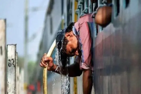 a women pouring water over her head